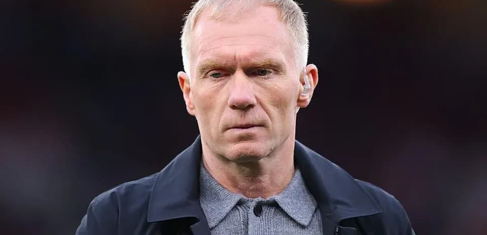 Man wearing a jacket during match preparations