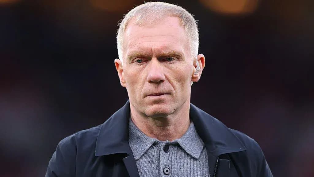 Man wearing a jacket during match preparations