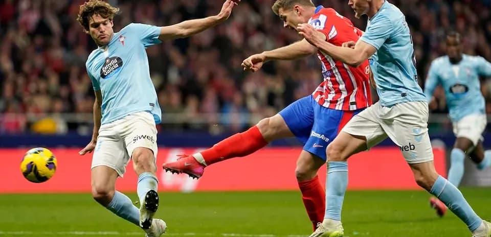 Atletico Madrid player attempting to score