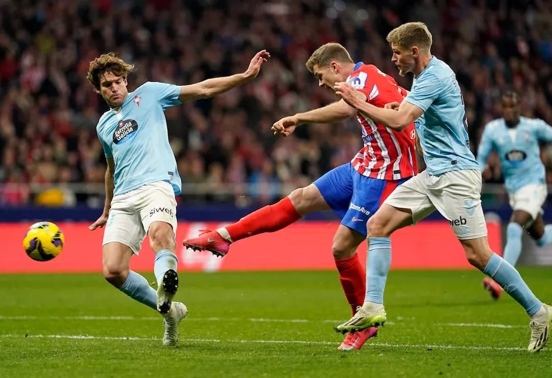 Atletico Madrid player attempting to score