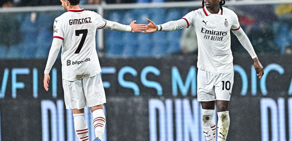 Genoa vs AC Milan players exchanging greetings