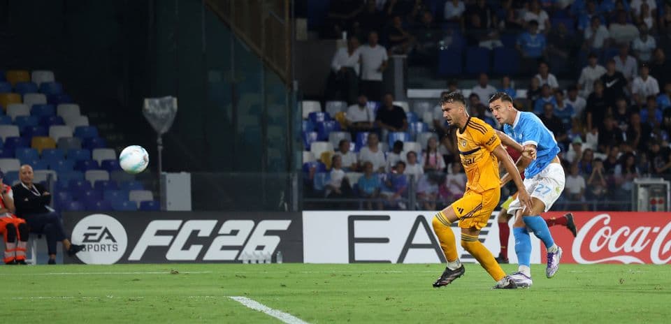 Pisa player chasing Napoli opponent during match