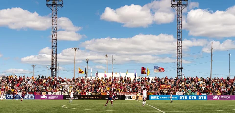 Detroit City fans cheering during football match