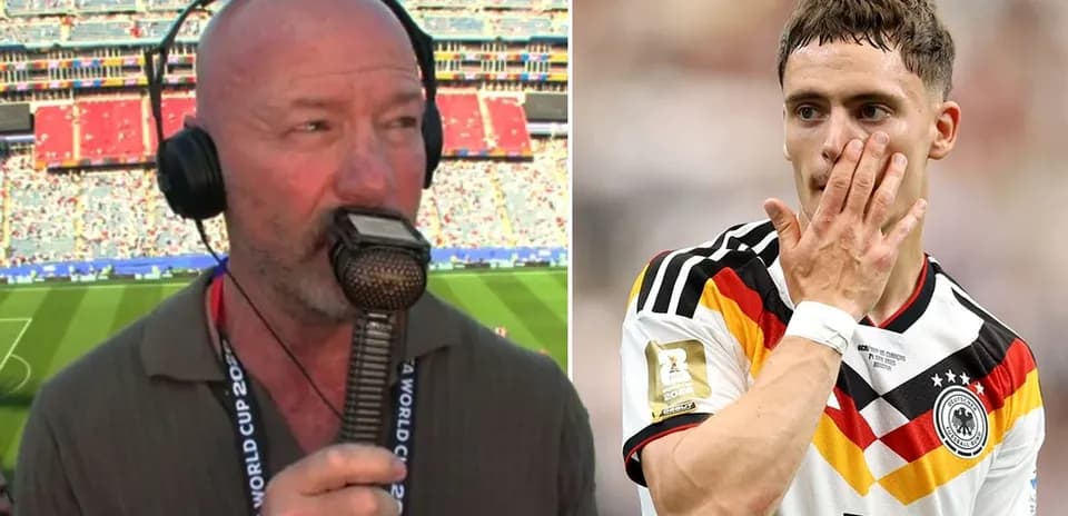 Commentator speaking into microphone at stadium
