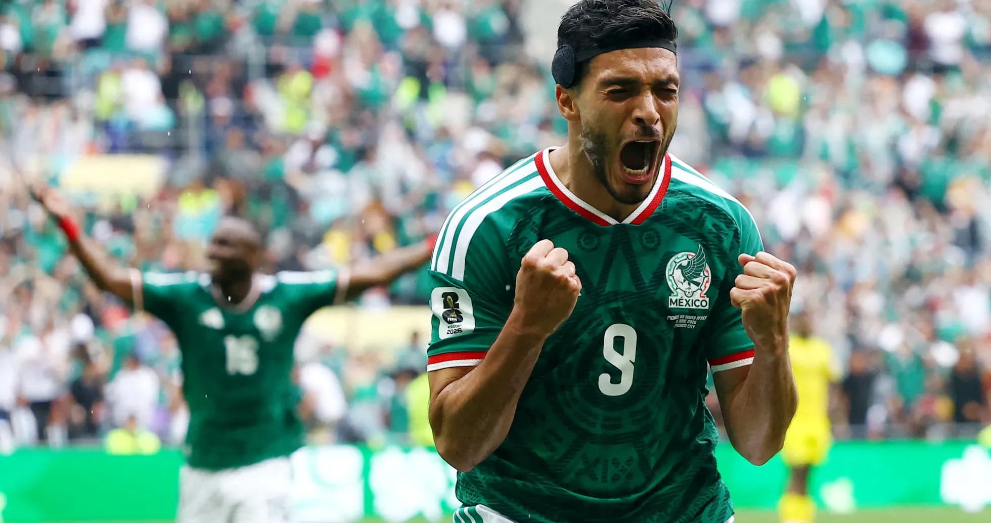 Raúl Jiménez celebrating a goal for Mexico
