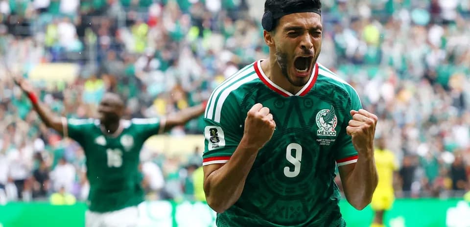 Raúl Jiménez celebrating a goal for Mexico