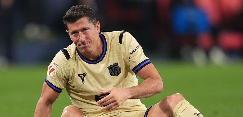Player sitting on field after a play