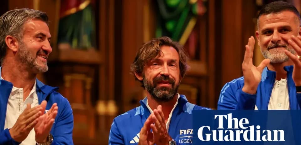 Three FIFA legends seated and applauding during event