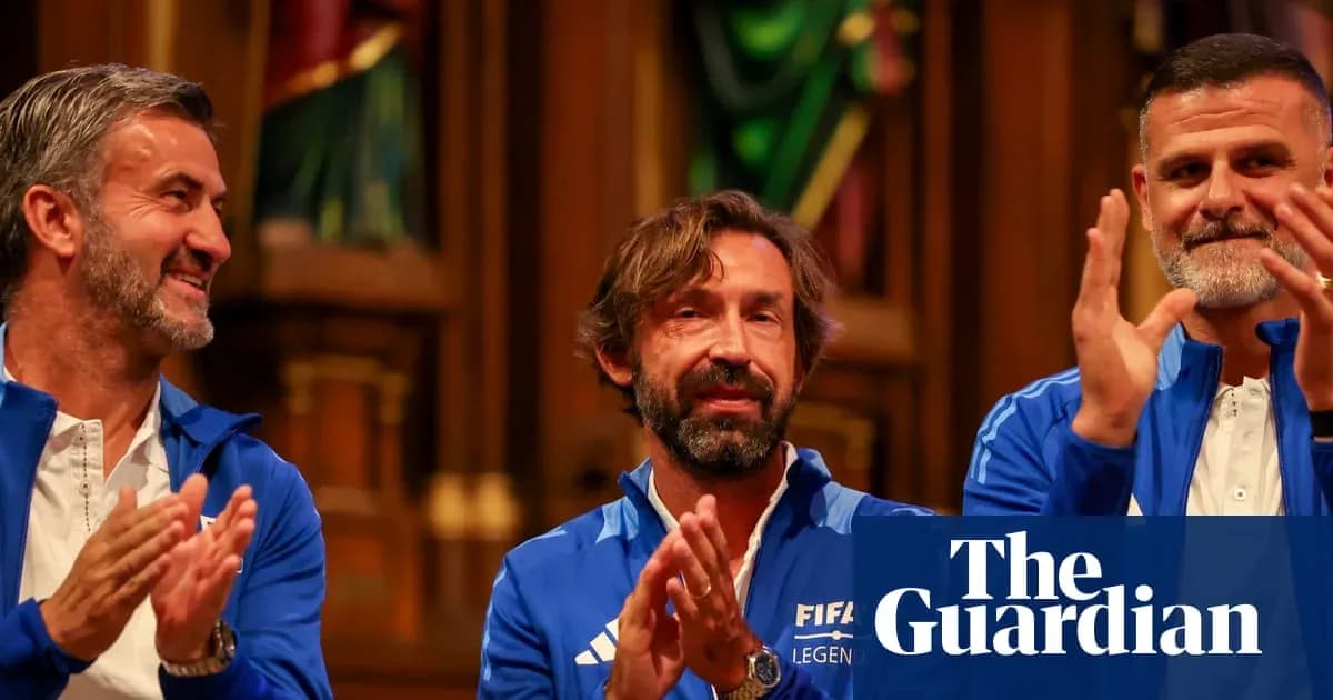 Three FIFA legends seated and applauding during event