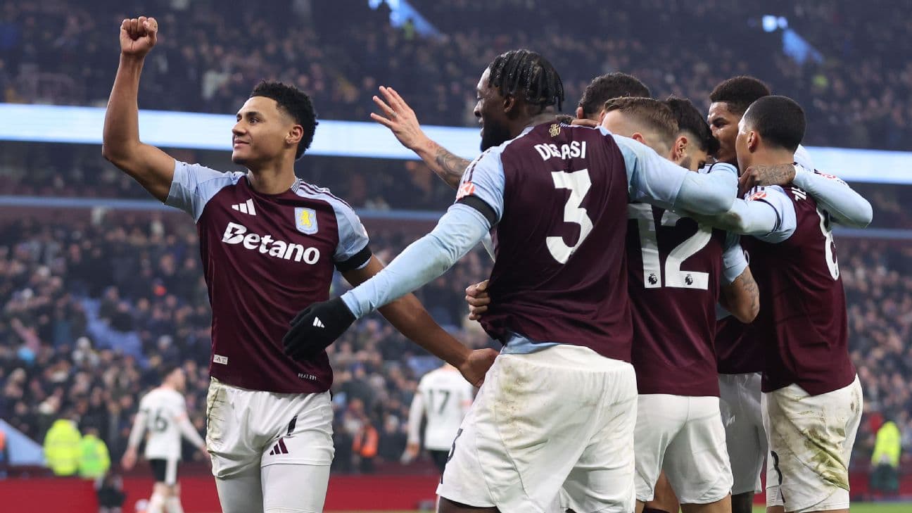 Aston Villa players celebrating a goal during match