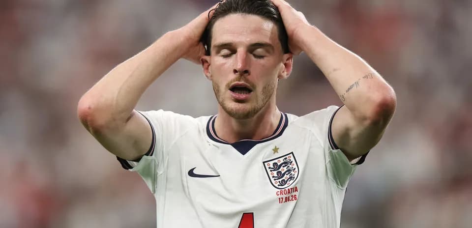 Player holding head in disappointment during match