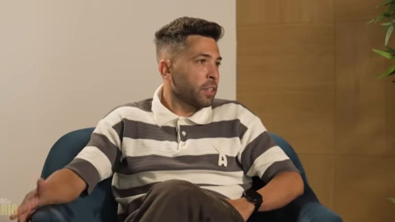 Man sitting in armchair during interview