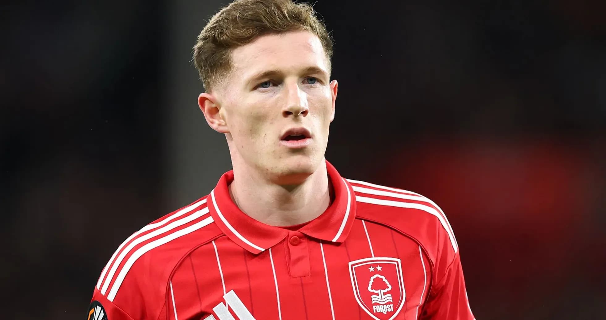 Player in red Nottingham Forest jersey on field