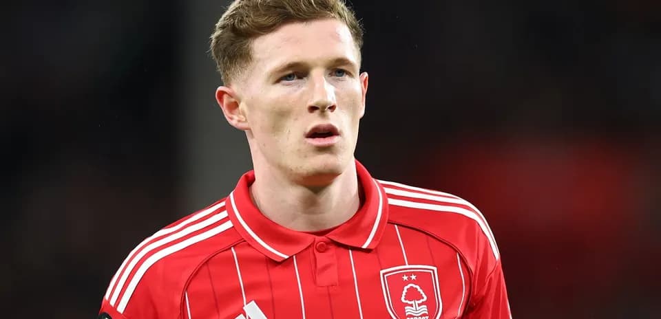 Player in red Nottingham Forest jersey on field