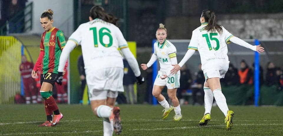 Players celebrating a goal during match