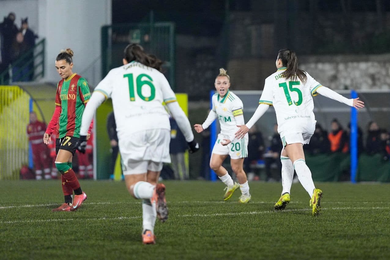 Players celebrating a goal during match