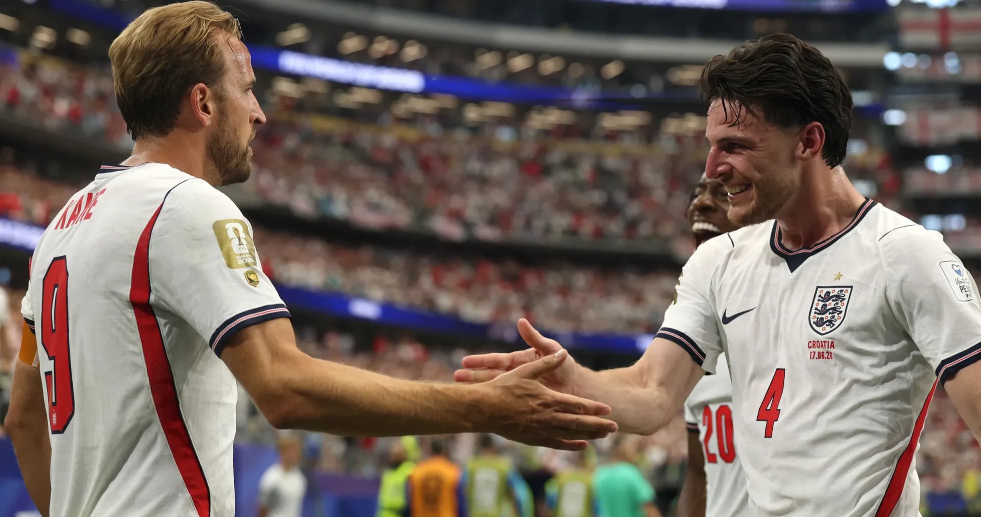 Harry Kane and Declan Rice celebrating on the pitch
