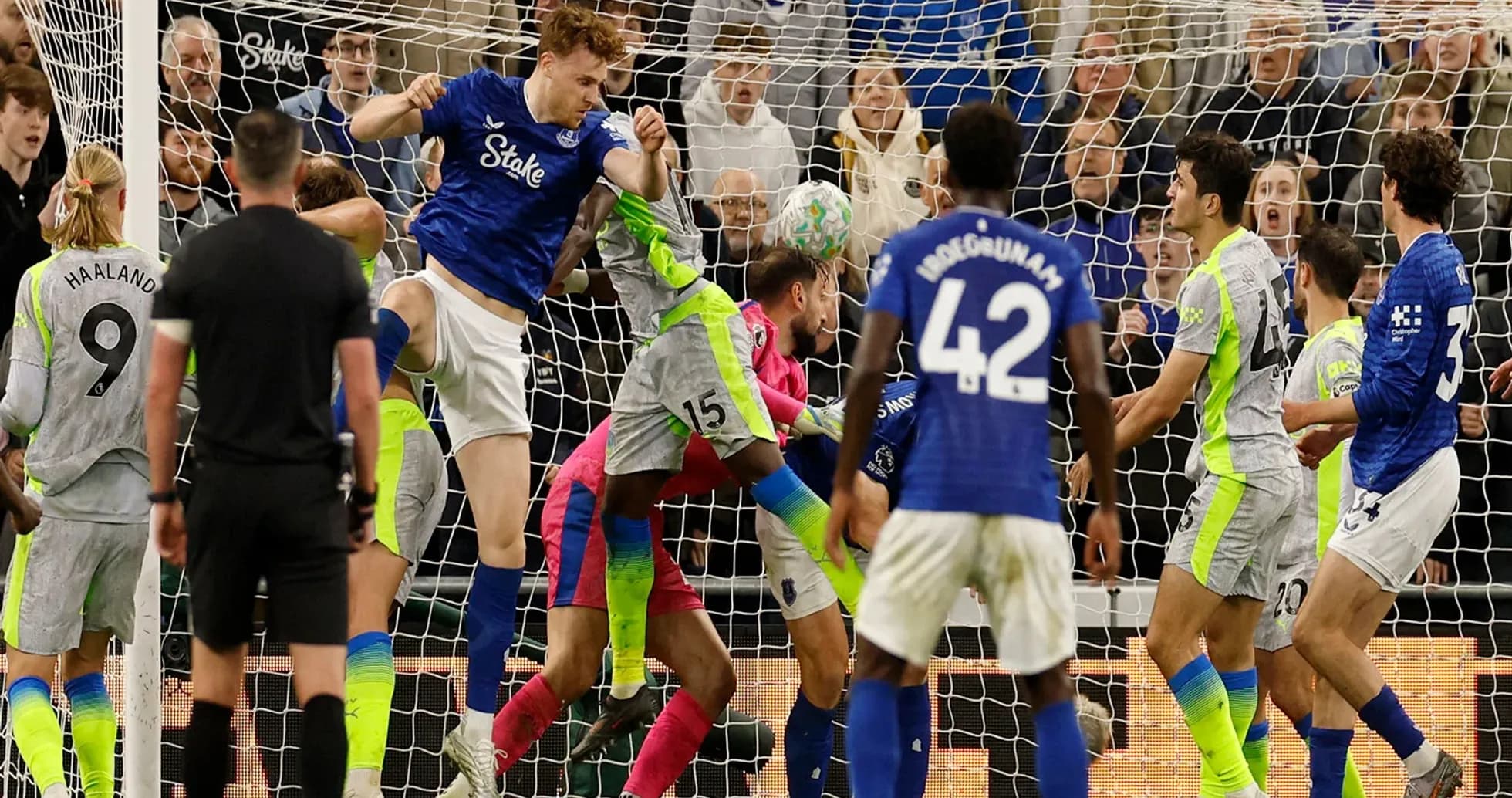 Players contesting a corner during Everton match