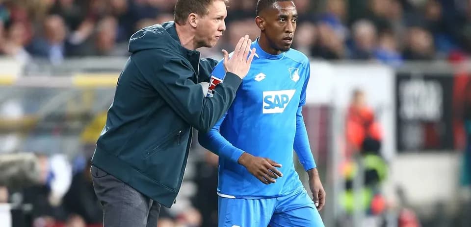 Coach instructing player during a match