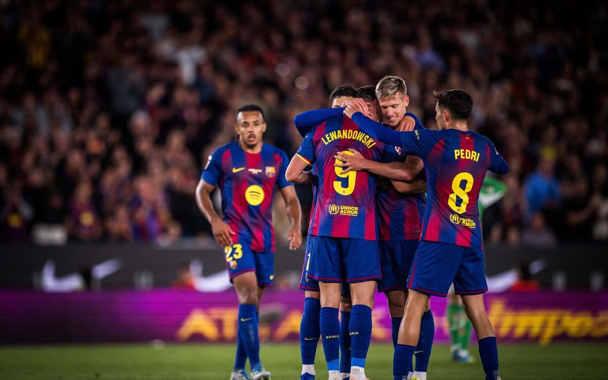 Barcelona players celebrating a goal during La Liga match