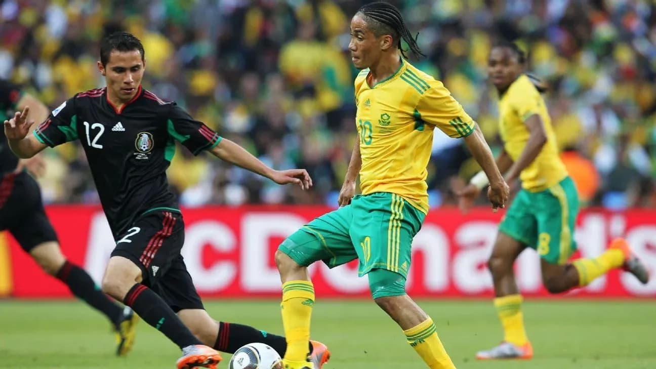Player dribbling the ball during match between teams