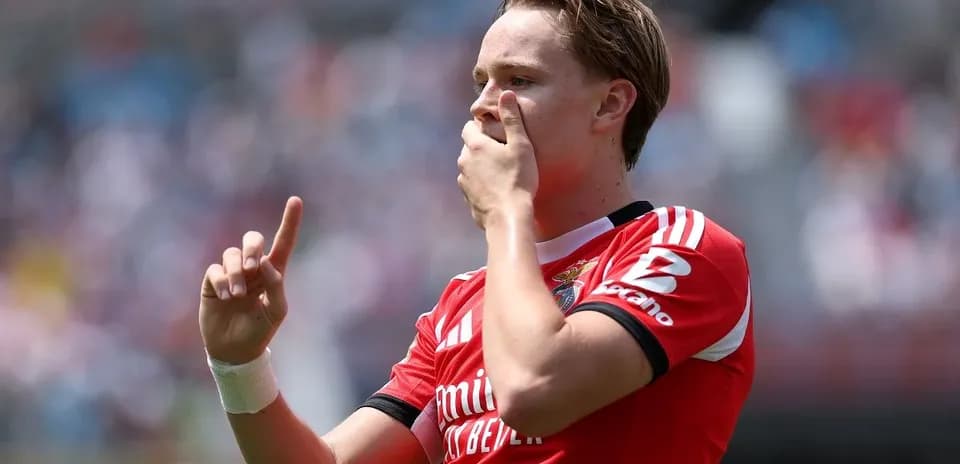Player celebrating with finger raised during match
