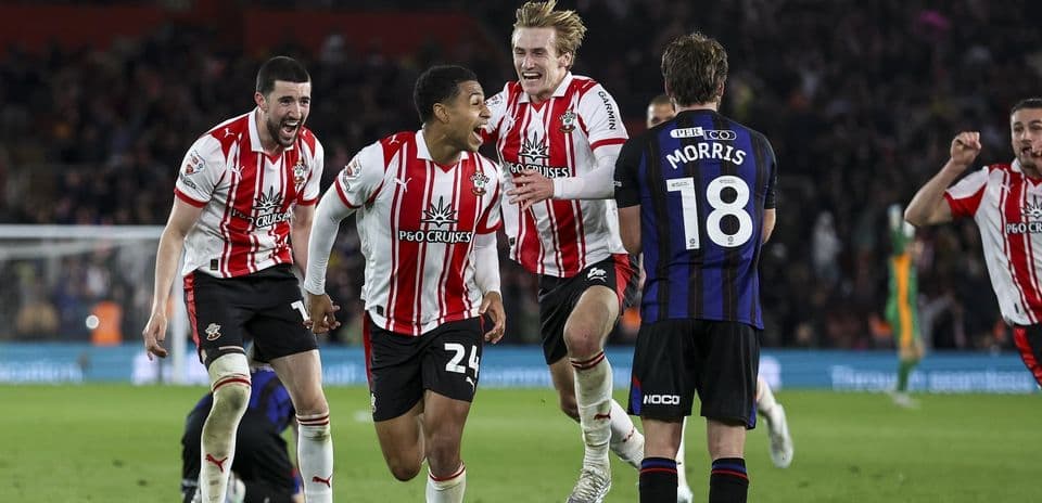 Southampton players celebrating a goal against opponent