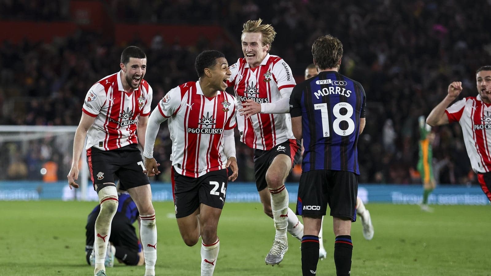 Southampton players celebrating a goal against opponent