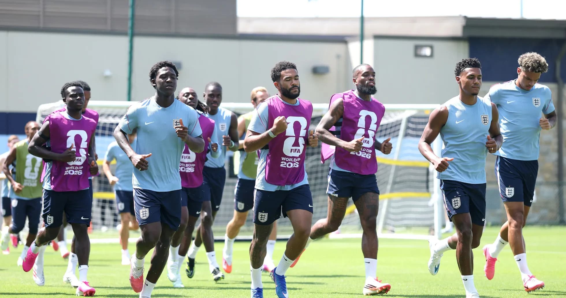 England players jogging during training session