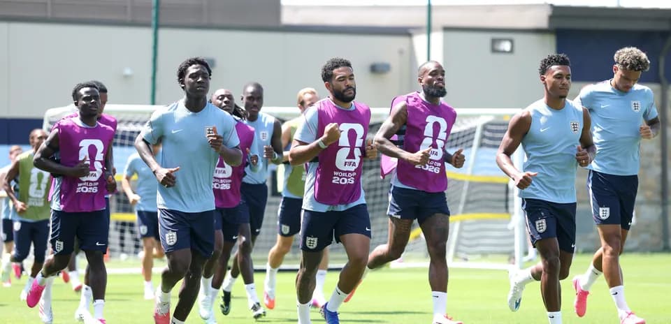 England players jogging during training session