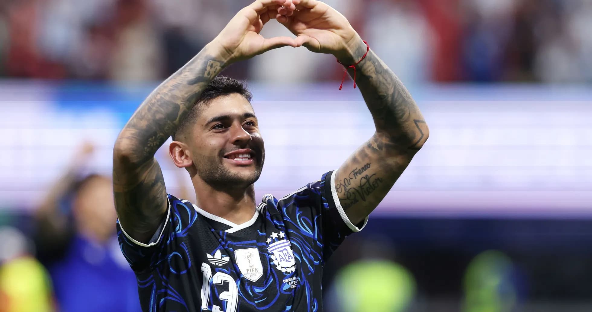 Player celebrating and making heart gesture after match