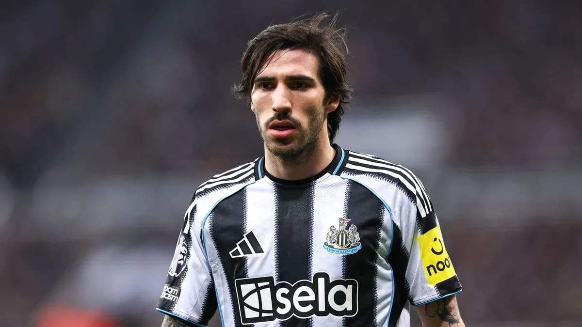 Newcastle player in home kit during match