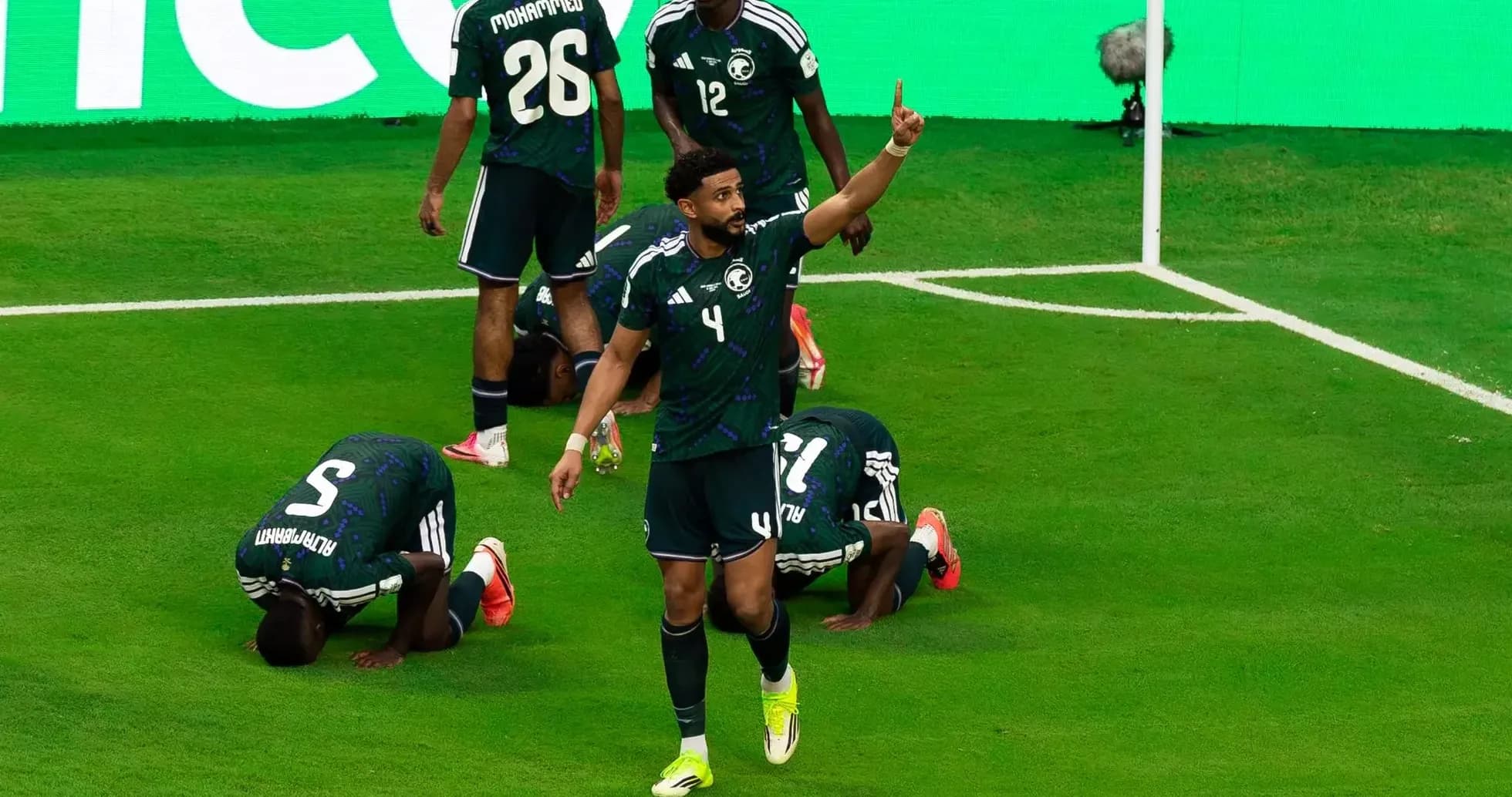 Saudi players celebrating during World Cup match