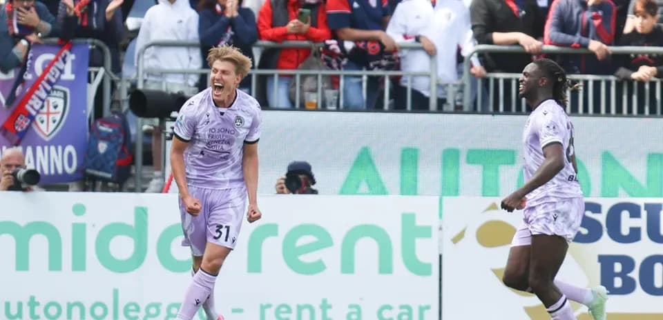 Players celebrating a goal during Cagliari vs Udinese