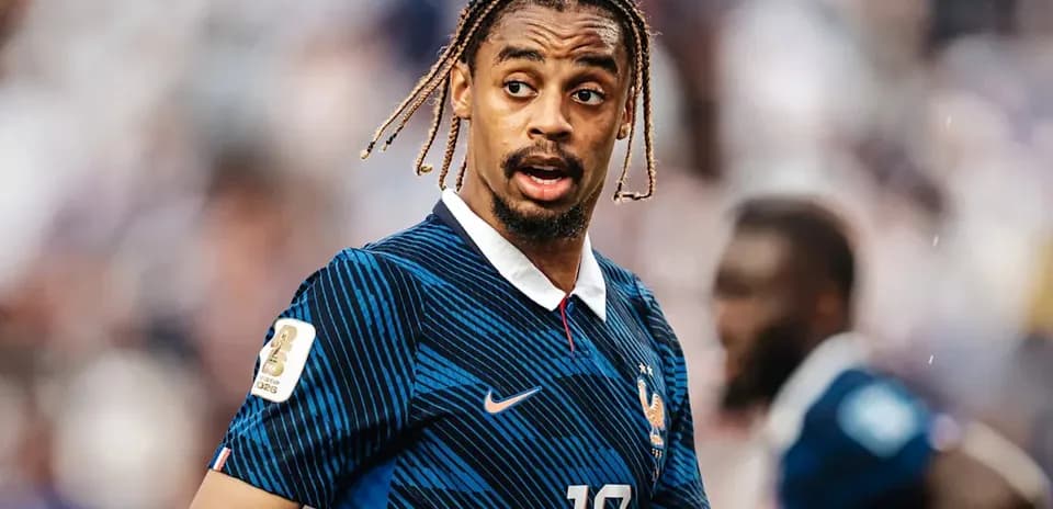 Player in blue France jersey on the field