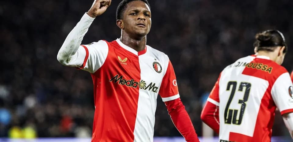 Player celebrating a goal in team uniform