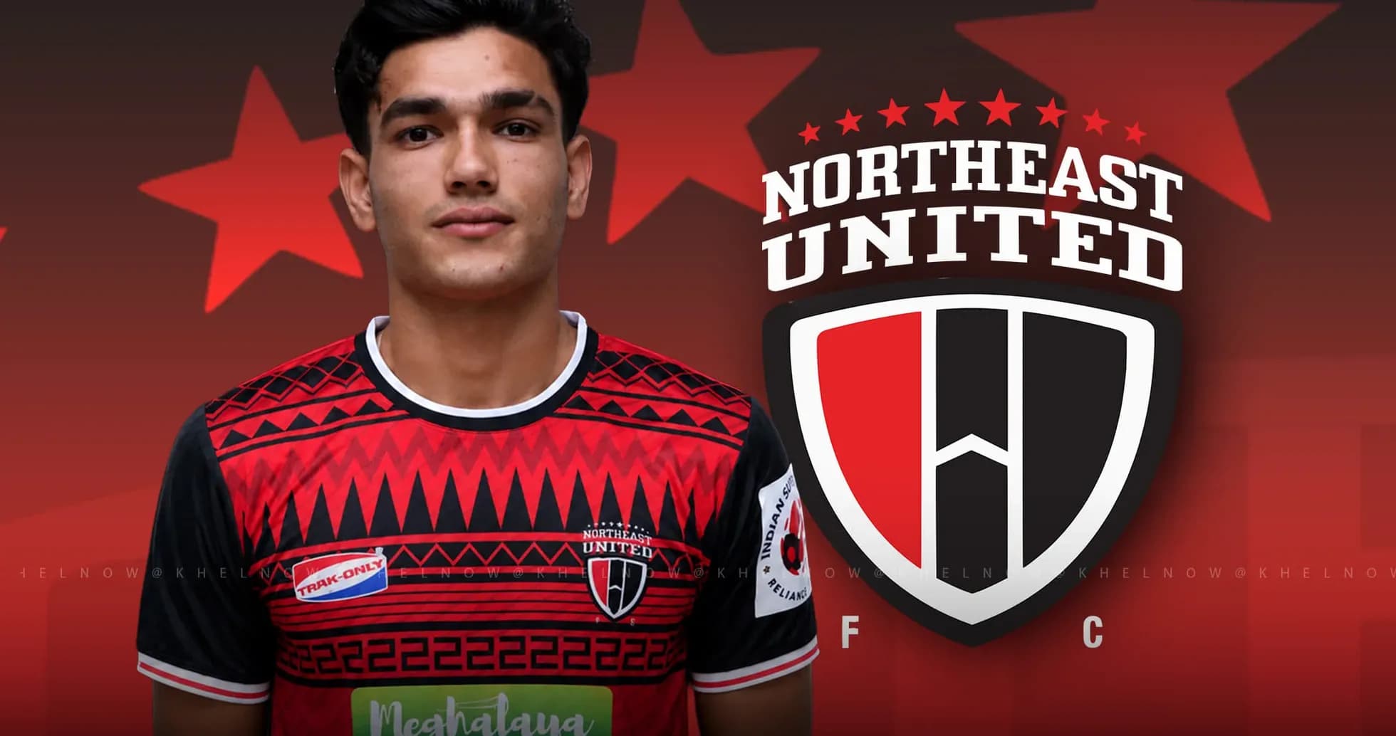 Player in Northeast United FC jersey posing for photo