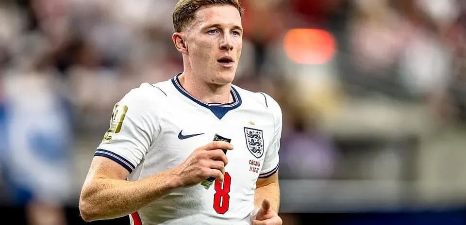 Player wearing England kit during match action