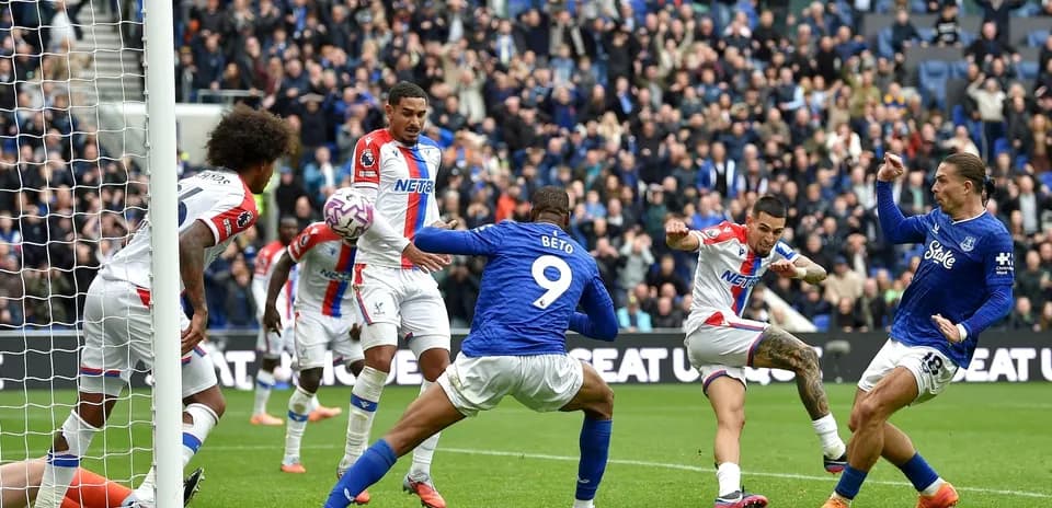 Players competing for the ball during match