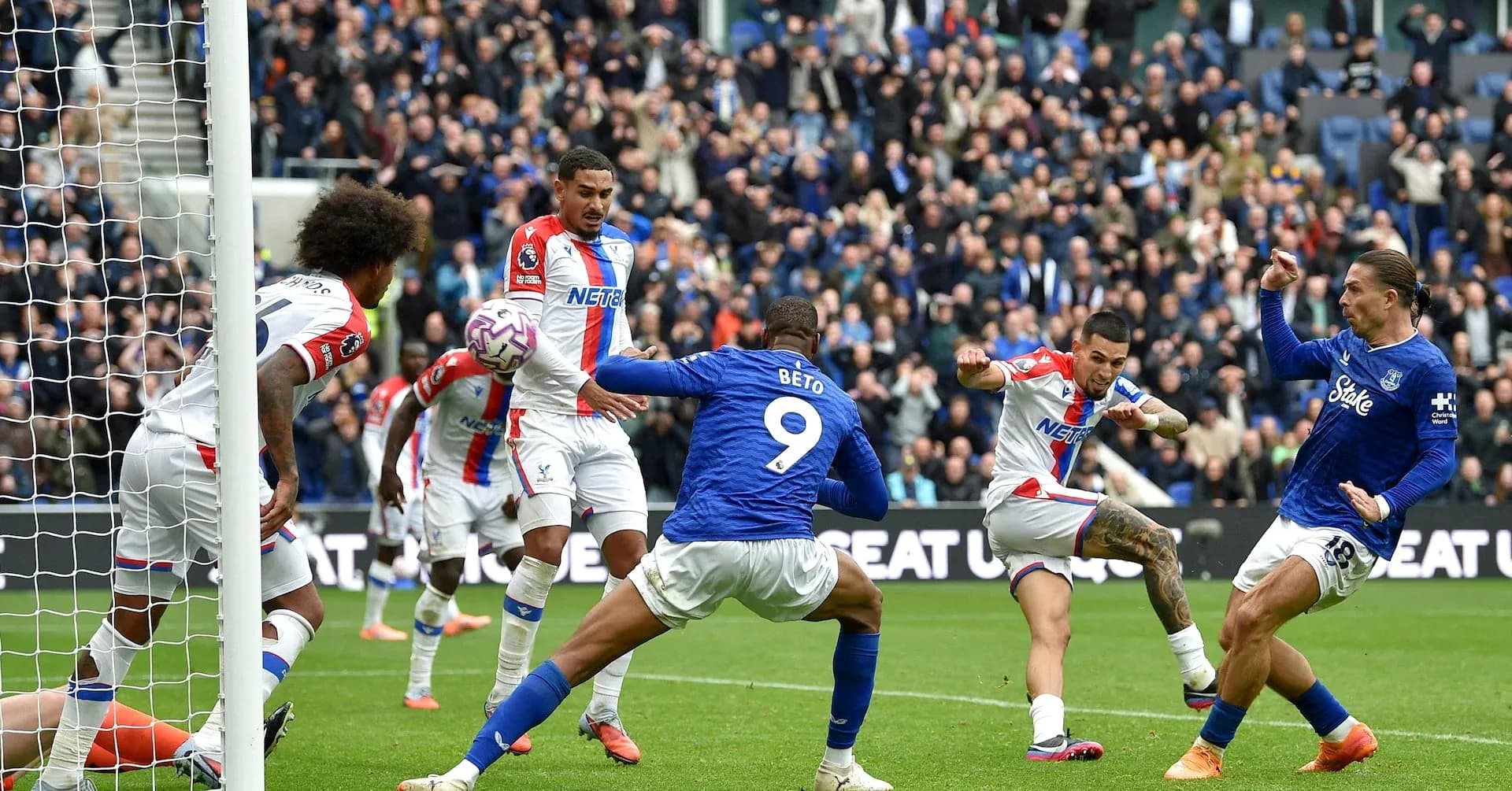 Players competing for the ball during match