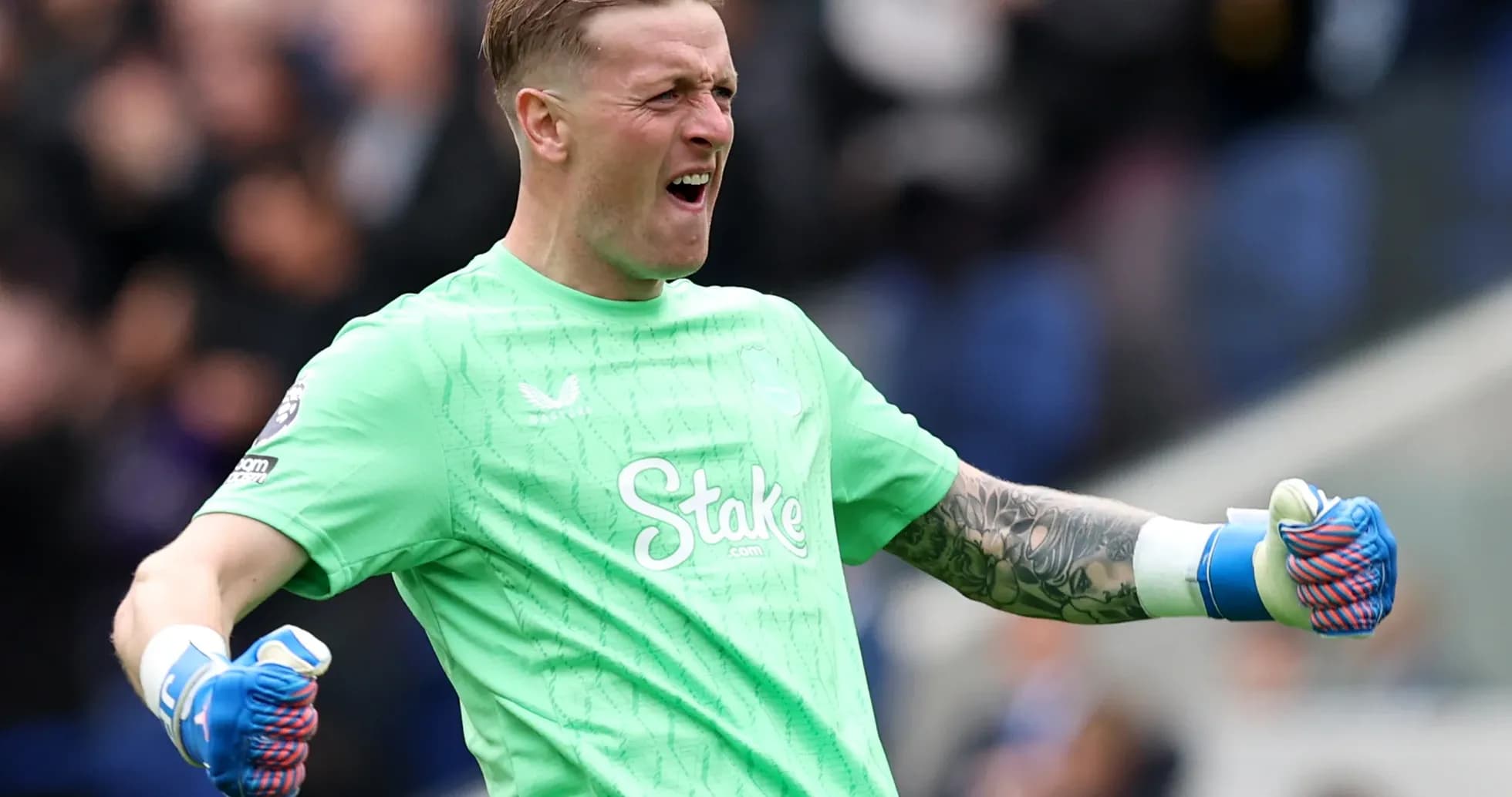 Everton goalkeeper celebrating during match