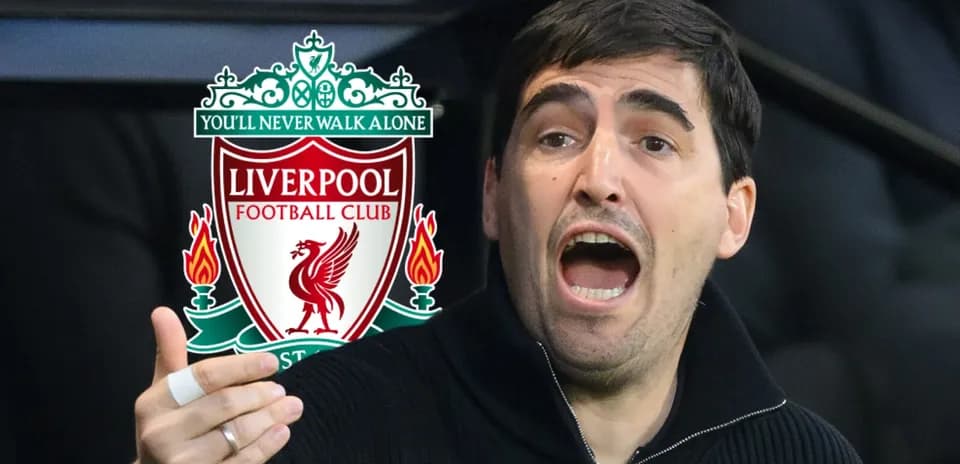 Coach passionately discussing tactics with Liverpool logo