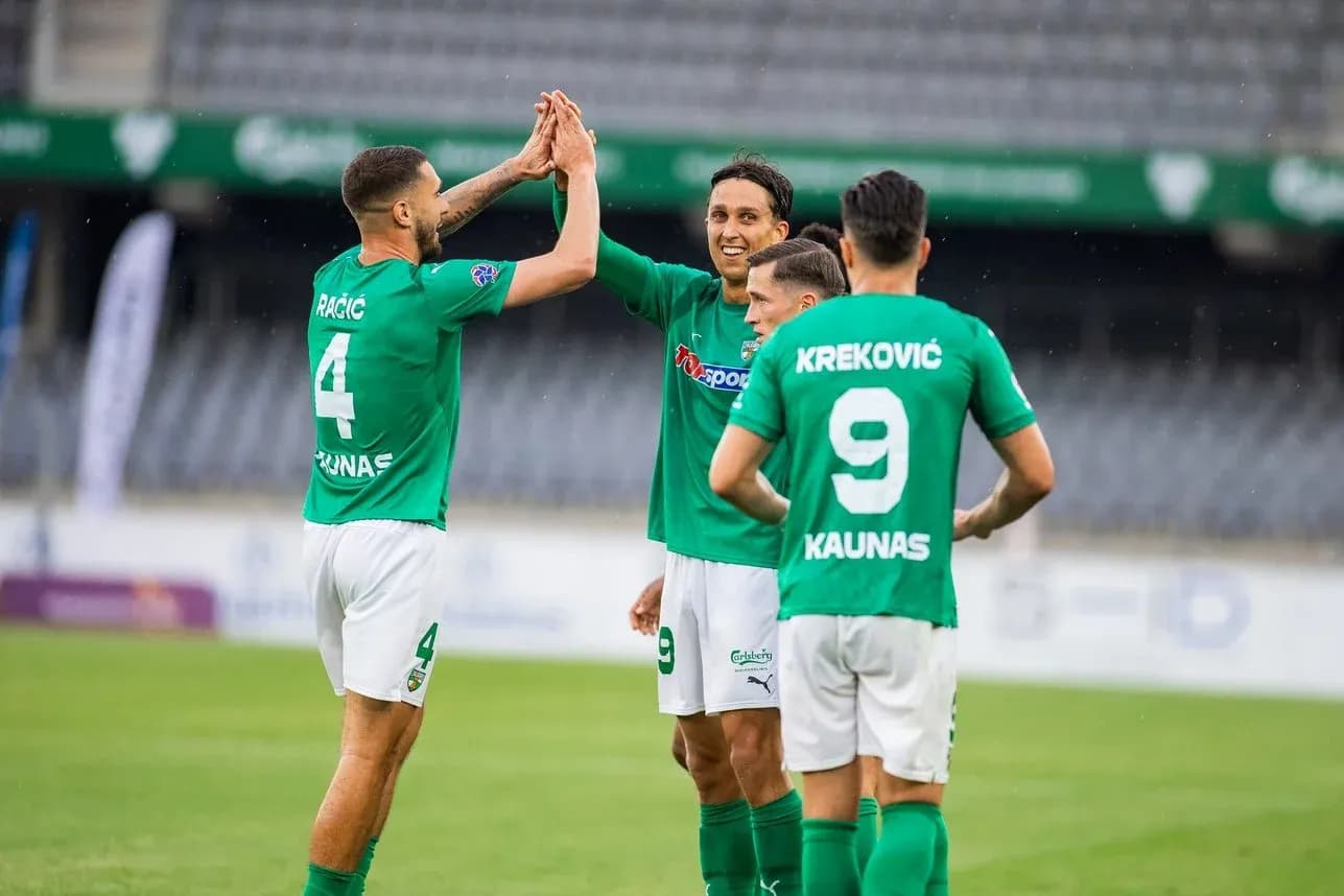 Players celebrating after scoring a goal