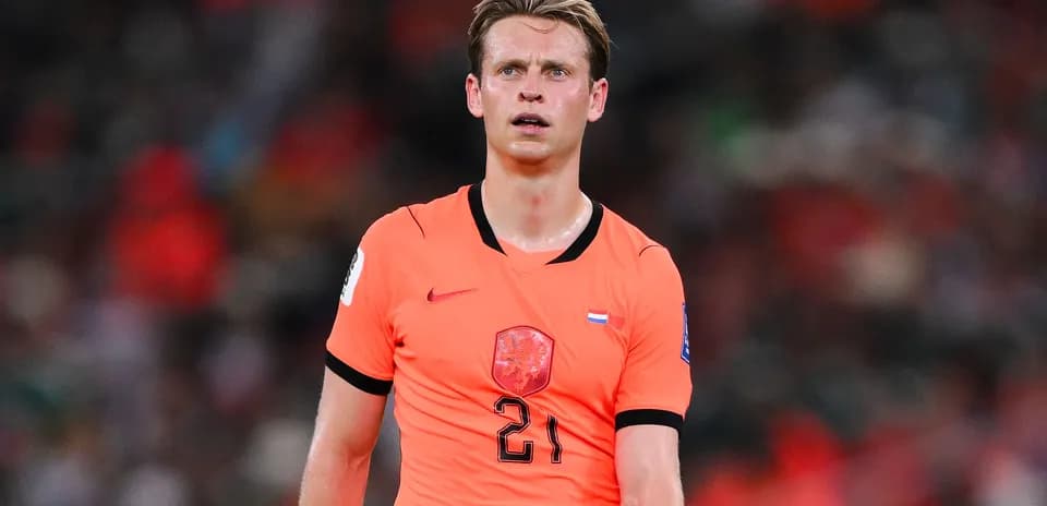 Player in orange jersey during a football match
