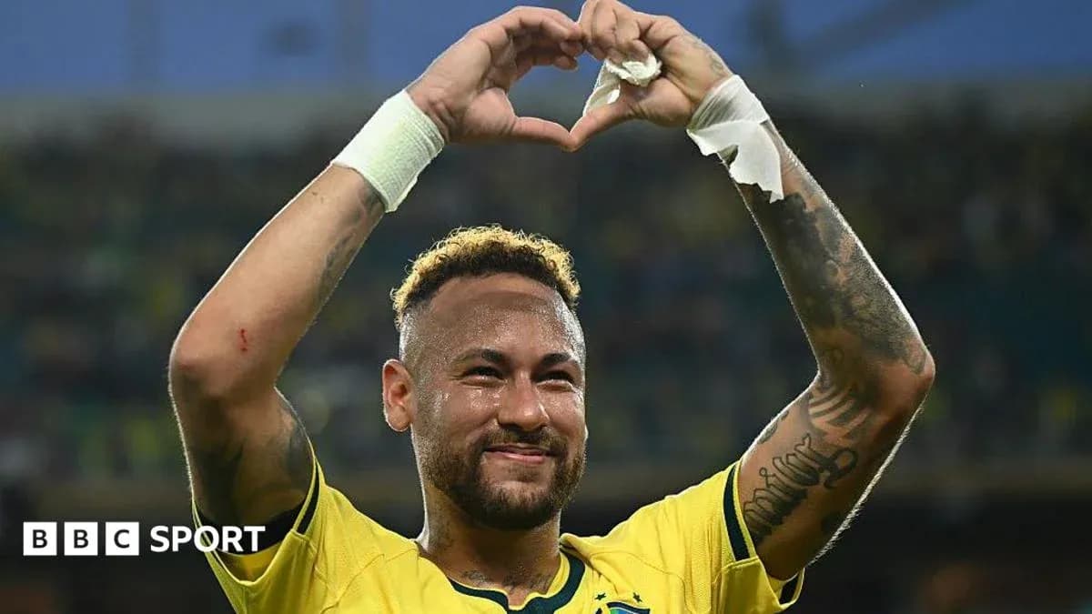 Neymar celebrating and making heart gesture