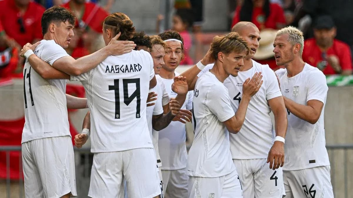 Players celebrating together after scoring a goal