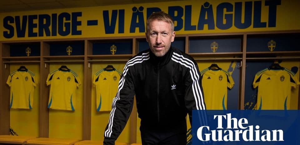 Coach posing in locker room with Sweden jerseys