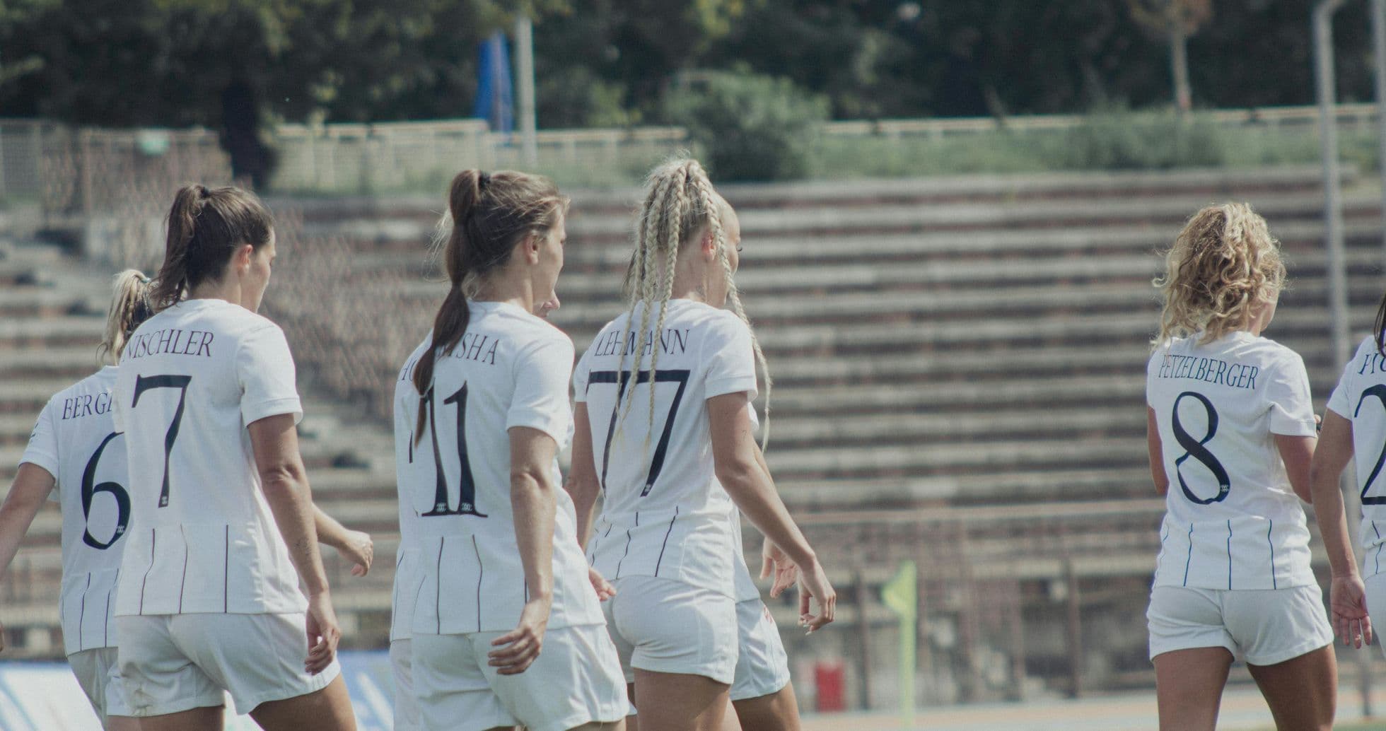 Players walking onto the field for match