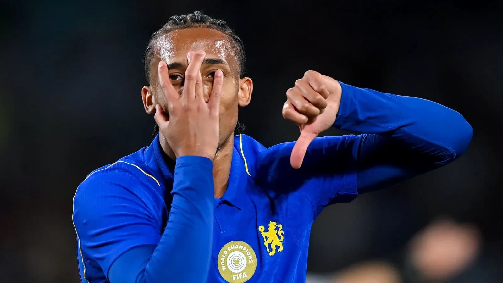 Player celebrating with hand gestures during match