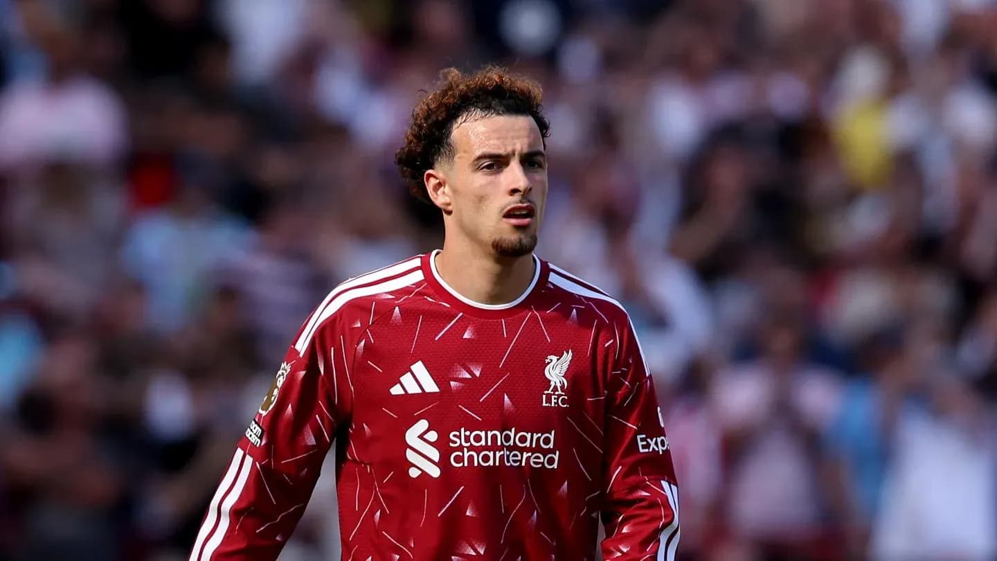 Player wearing Liverpool kit during match